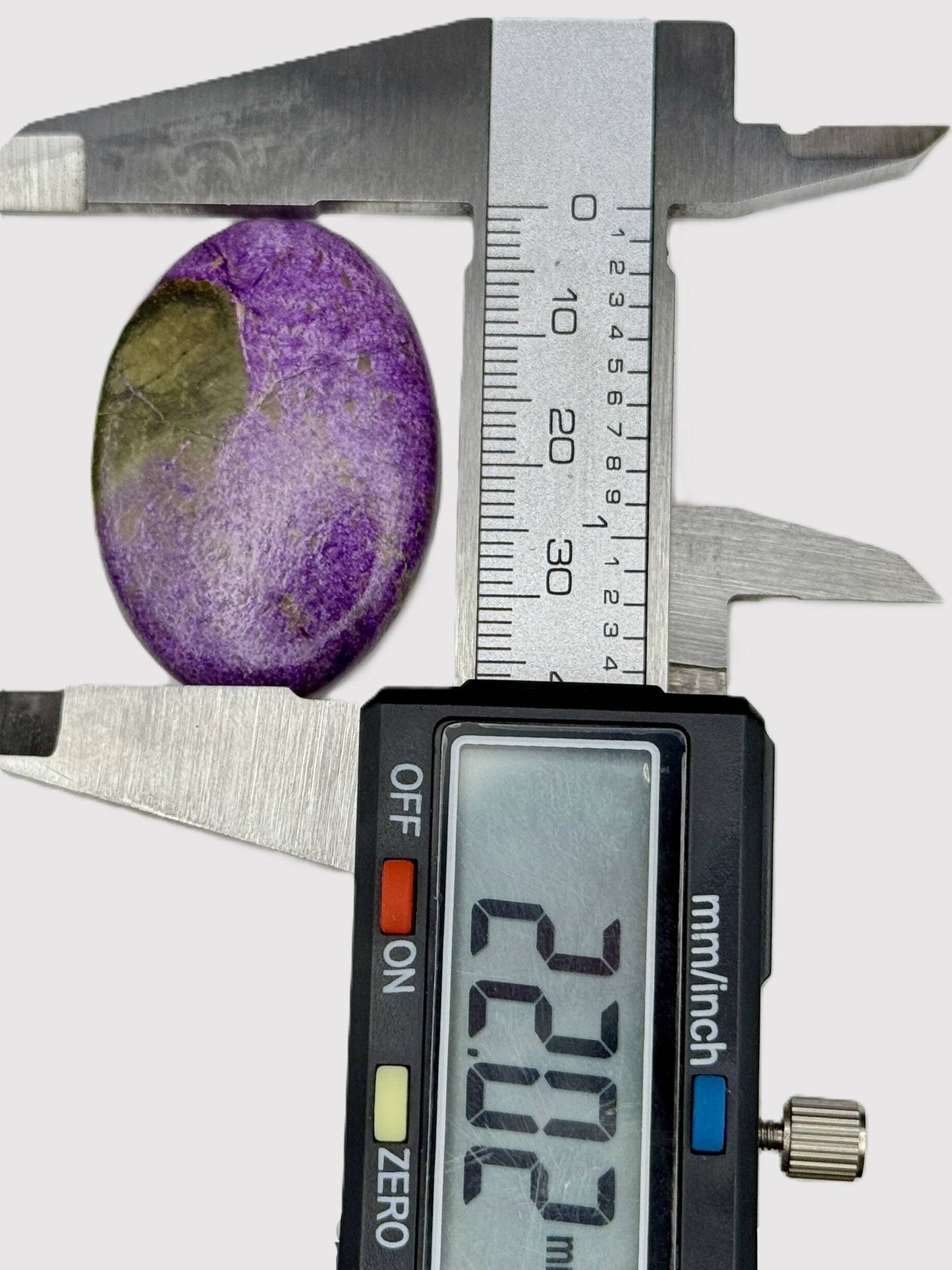 Glossy Atlantisite oval cabochon gemstone 45 carats