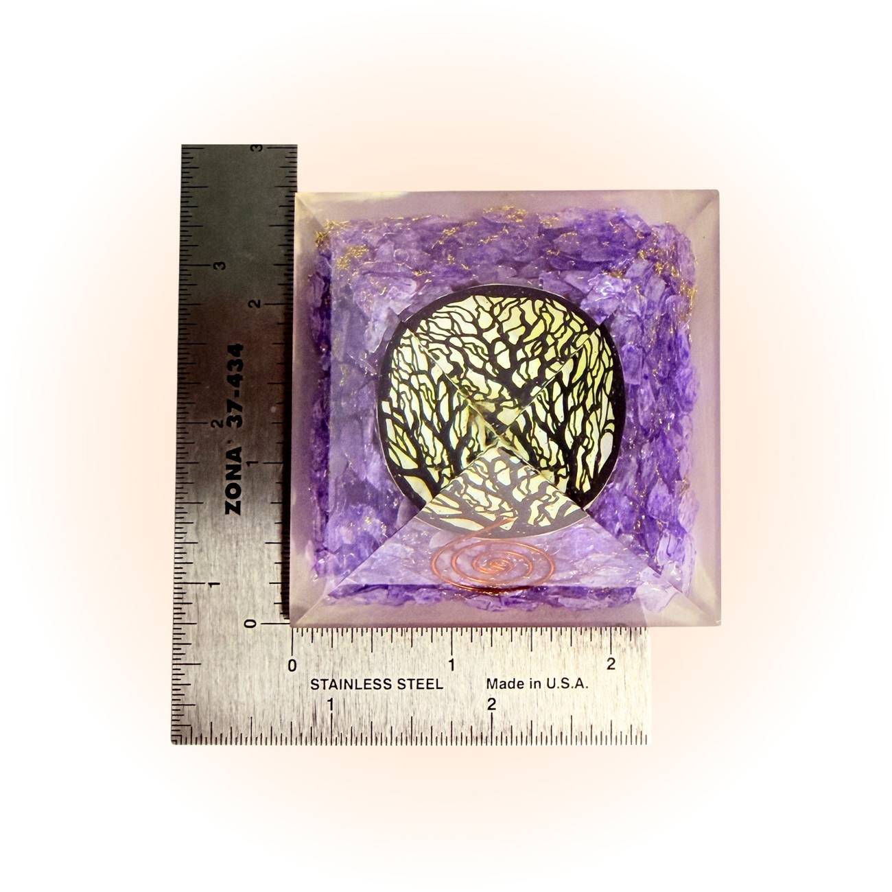 Amethyst Tree of Life Orgonite Pyramid with ruler for scale, showcasing compact size for home decor and spiritual energy alignment.