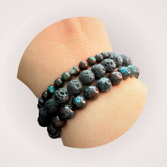 Stacked Peruvian Chrysocolla 8mm Bracelet - Heart Alignment worn on wrist, paired with lava stone bracelets for a grounding, calming look.