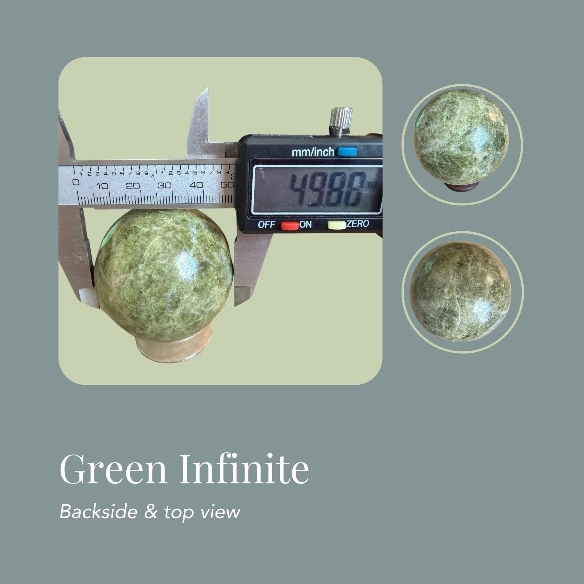 Infinite Stone sphere greens veining, multi view. View of sphere with caliper showing 49.88 mm diameter.