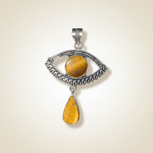 Tigers Eye Evil Eye Drop Pendant in Sterling Silver featuring a round tiger’s eye stone at the center with a teardrop charm below. Ideal for spiritual jewelry lovers. Front view.