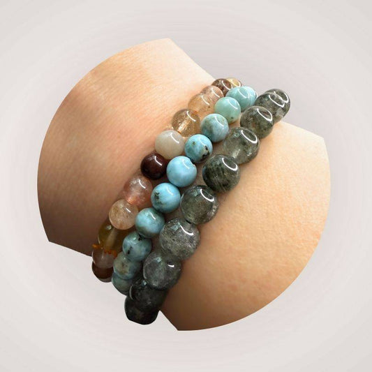 Stacked beaded bracelets on wrist featuring Lodolite (Garden Quartz) 8mm bracelet, ideal for jewelry lovers seeking inner clarity and grounding.