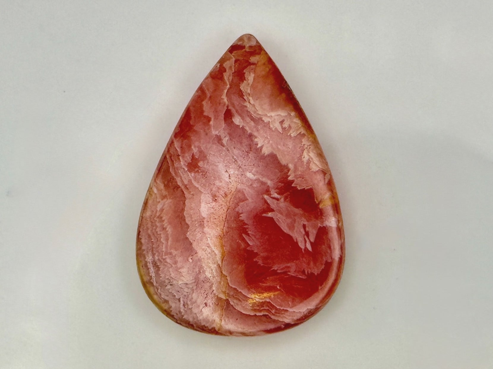 Tear drop shaped Rhodochrosite cabochon, 70ct polished pink gemstone from India