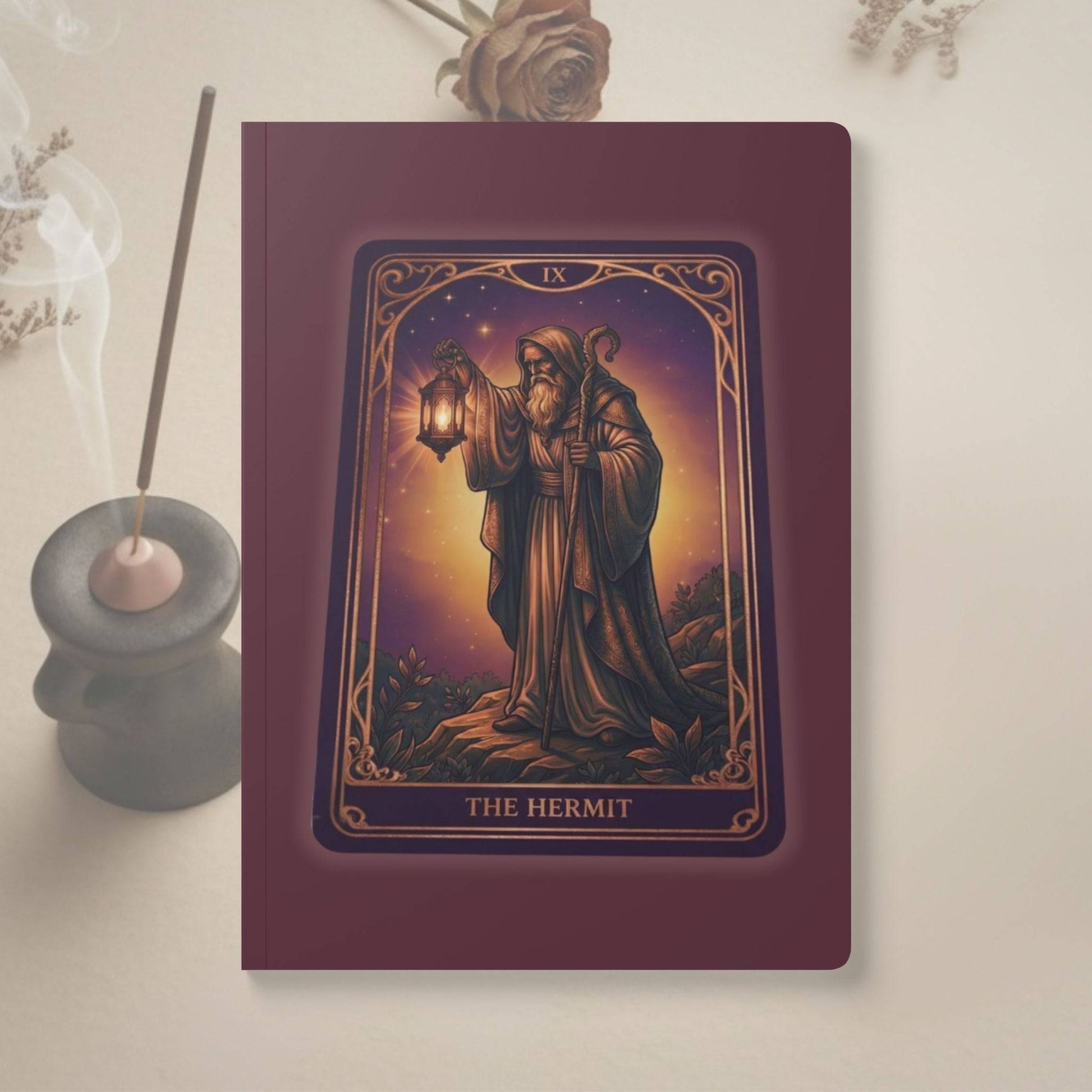 The Hermit Tarot Journal - Soft Cover by Mystic Parcel featuring a mystical tarot card design on a burgundy cover, ideal for journaling or note-taking.