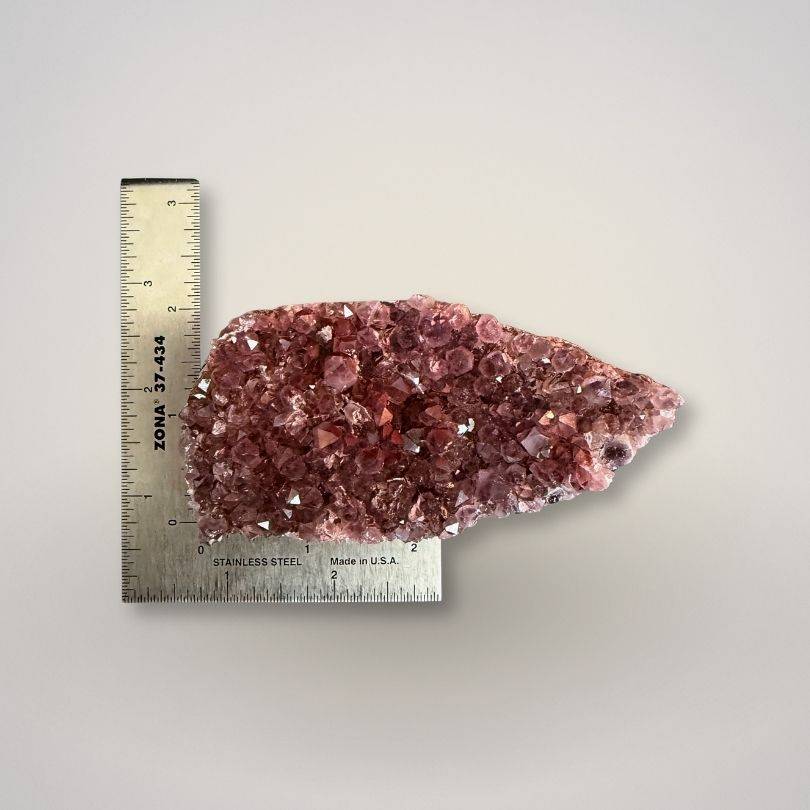 Alaçam Amethyst specimen | 199g emotional balance, spiritual awareness measured against a ruler, highlighting its size and natural crystal structure.