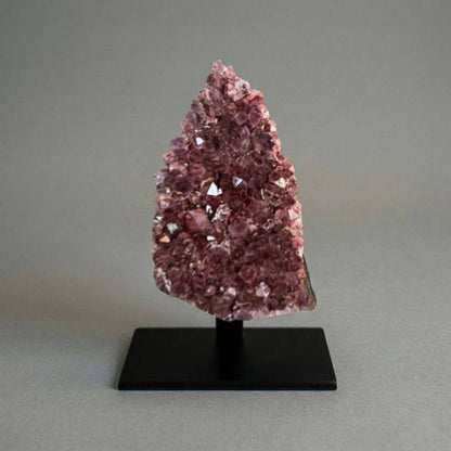 Alaçam Amethyst specimen | 199g emotional balance, spiritual awareness displayed upright on a black stand, showcasing its pointed crystal formation.