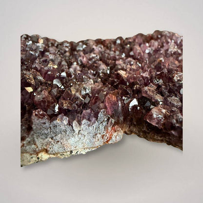 Close-up of Alaçam Amethyst Collector Specimen — Deep Purple Cluster (227g) highlighting vibrant crystal formations and natural sparkle.