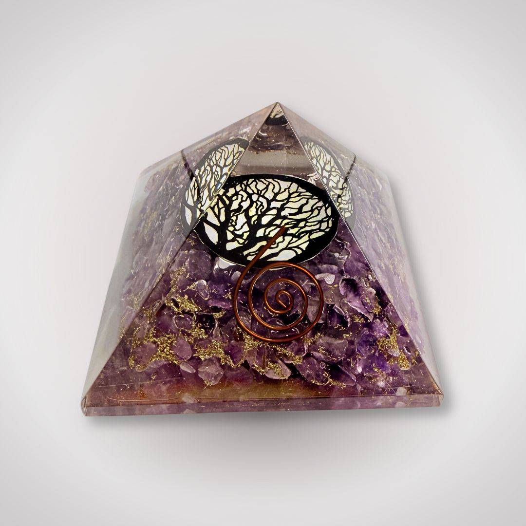 Amethyst Tree of Life Orgonite Pyramid with copper coil and gemstone chips, ideal for calming energy and mindfulness decor.
