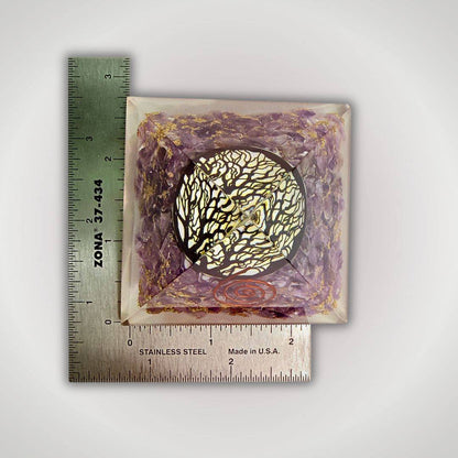 Amethyst Tree of Life Orgonite Pyramid measured with ruler, highlighting compact size for home decor and energy healing use.