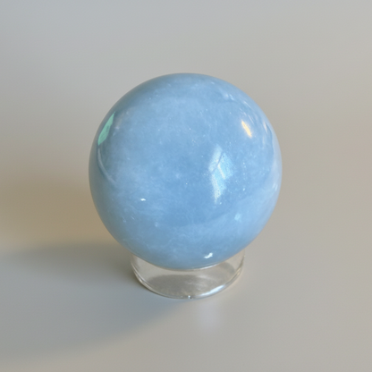 Buy Angelite Sphere for Meditation - Calm & Soothing. Handcrafted sky-blue mineral sphere from Peru ideal for spiritual connection and energy healing.