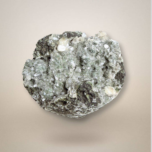 Green Apophyllite with Stilbite Geode Cluster - Small Collector Specimen featuring shimmering green crystals and white stilbite on a dark matrix.