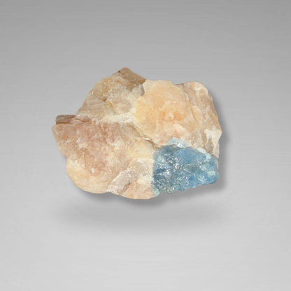 Raw Brazil Gem Trio specimen with visible blue aquamarine and peach moonstone tones. A striking addition to any gemstone or mineral collection.