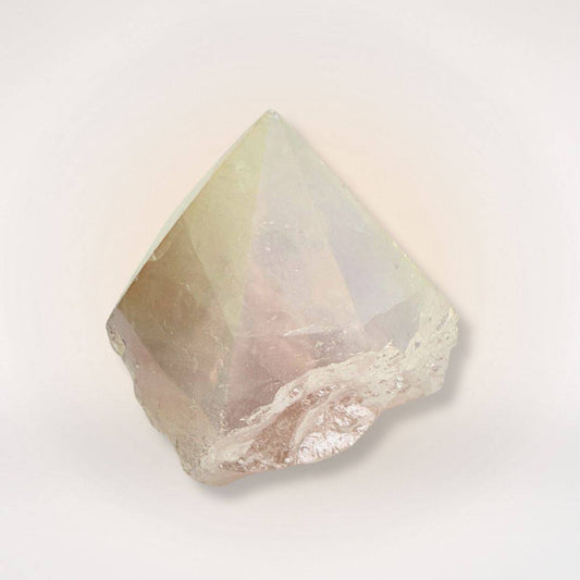 Aura Coated Quartz Point with polished tip and raw natural sides, showcasing iridescent clarity for energy work and crystal collections.