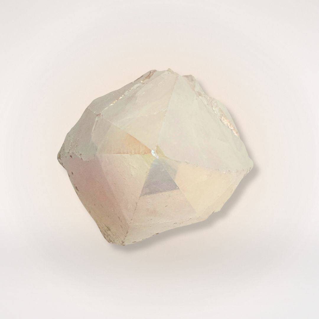 Polished Aura Coated Quartz Point featuring a multi-faceted top and natural rough base, ideal for gemstone collectors and spiritual use.