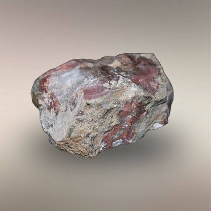 Bou Hamza Agate host-free nodule exterior from Al Hama, Morocco with exposed rose agate and natural rind.