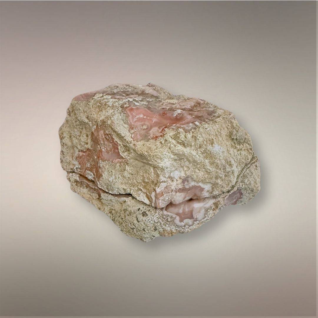 Full Bou Hamza Agate nodule exterior showing natural host-free surface and exposed rose agate windows.