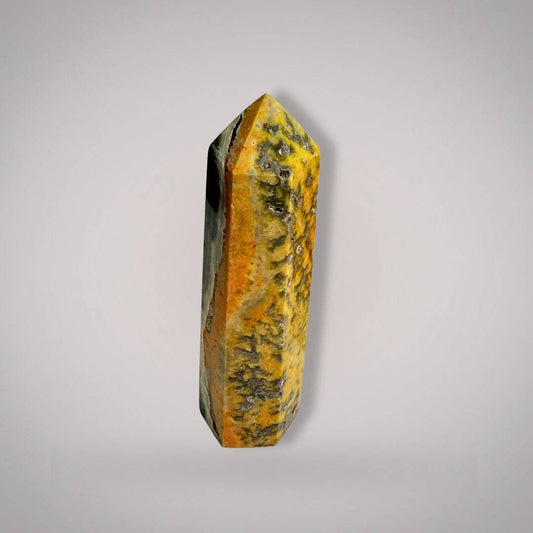Polished 100mm Bumblebee Jasper Tower featuring vivid yellow, orange, and black banding. Ideal for enhancing creativity and energy flow.