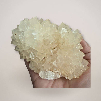 Cream-colored calcite mineral with sharp crystal formations, Indian specimen for arts and hobbies
