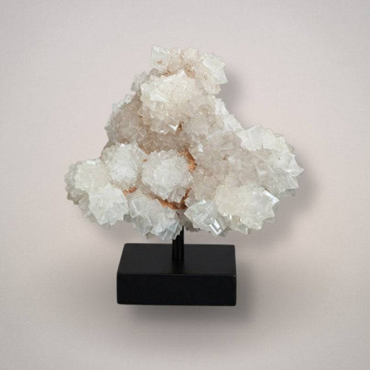 displayed calcite mineral with UV fluorescence India on stand for display perspective