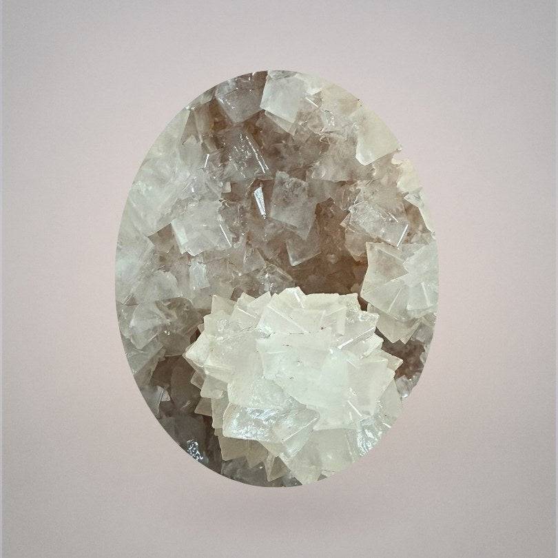 Close-up of phosphorescent calcite cluster with green glow from India - close up macro view