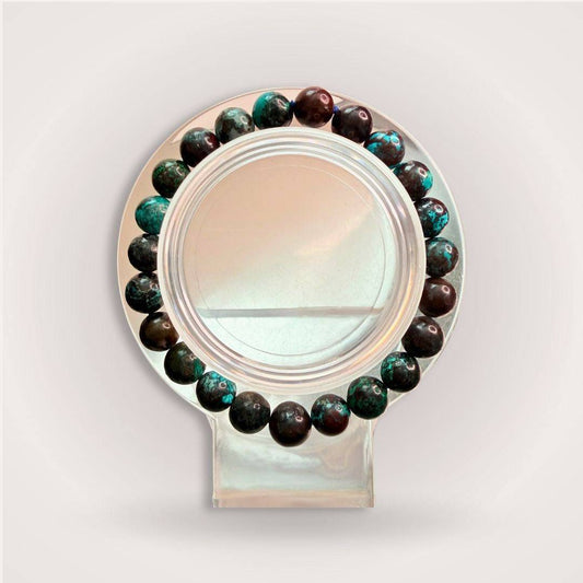 Chrysocolla beaded bracelet from the Still Point Aligned Pairing, featuring deep green and brown tones for grounding and emotional balance.
