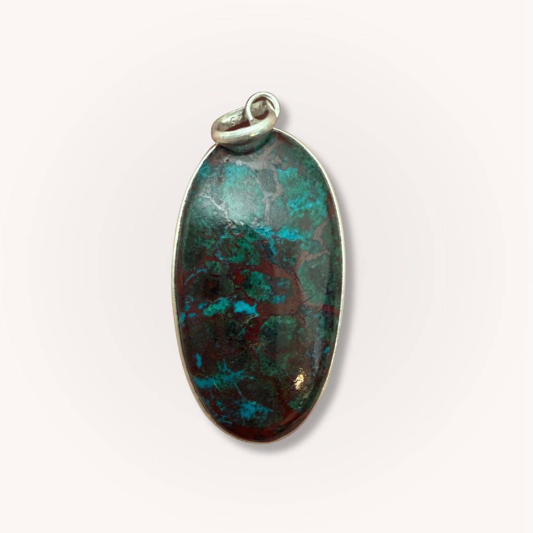 Oval Chrysocolla Pendant for Calm & Heart Healing by Mystic Parcel, showcasing a polished green and copper gemstone with silver bail.