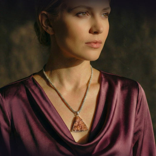 Triangular Citrine Drusy Pendant – Sacred Geometry Style on model with purple blouse