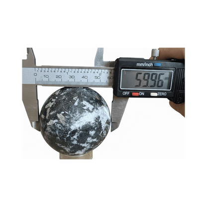 Covellite Polished Sphere measuring 59.96mm in diameter with digital caliper, ideal for enhancing intuition and spiritual connection.