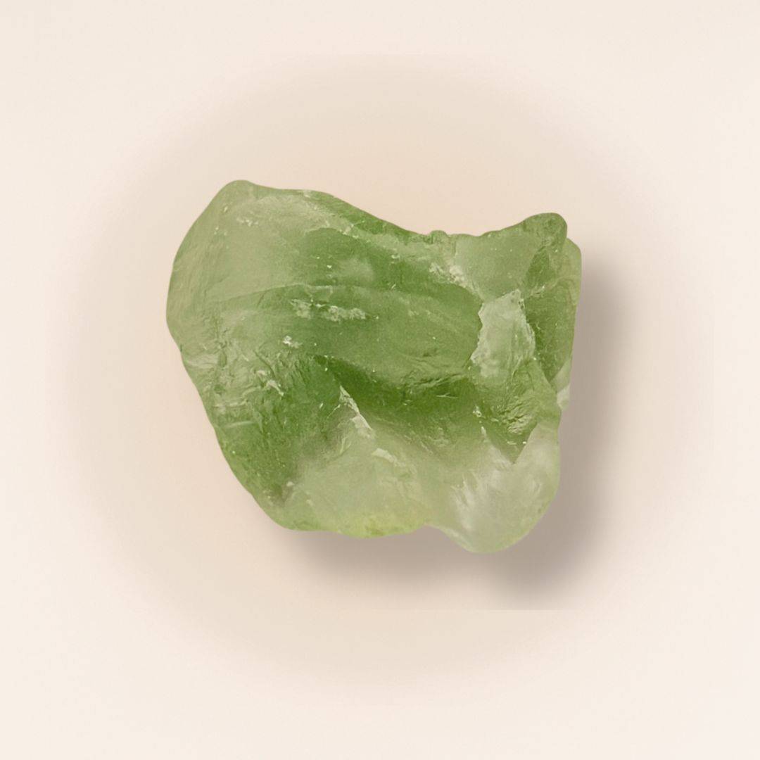 Green fluorite raw piece for mental clarity and focus, featuring natural texture and translucent surface. Ideal for crystal healing and meditation.