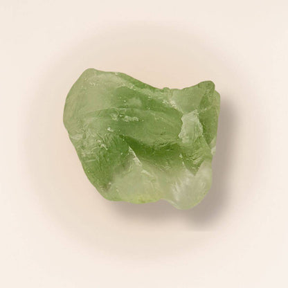 Green fluorite raw piece for mental clarity and focus, featuring natural texture and translucent surface. Ideal for crystal healing and meditation.