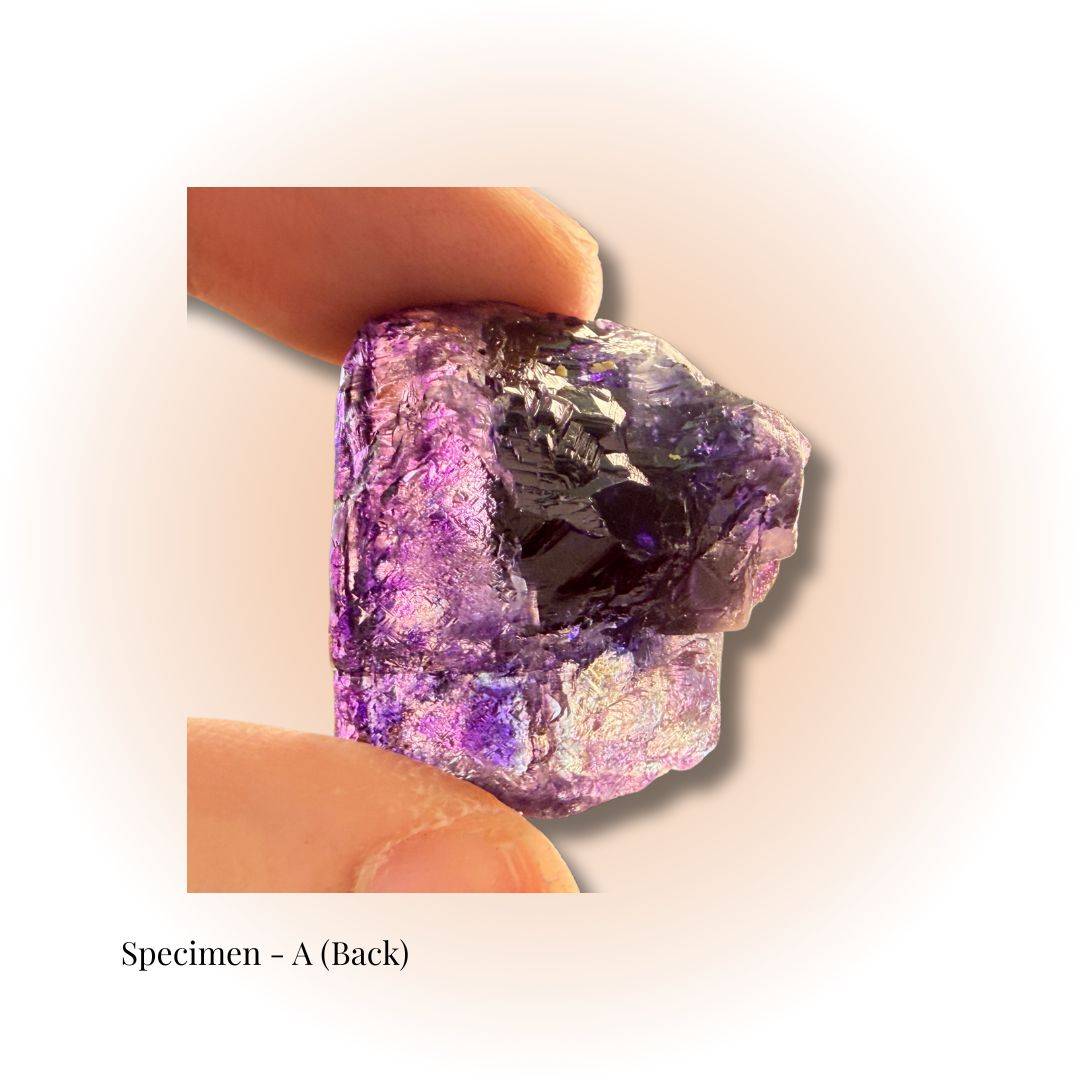 Brazilian Purple Fluorite crystal specimen A (back view) showcasing deep violet hues and natural geometric formations for clarity and focus.