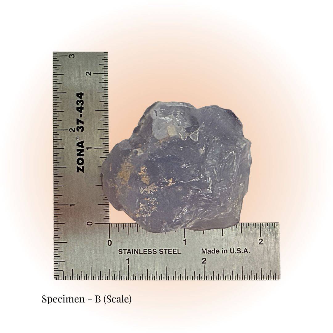 Brazilian Purple Fluorite crystal specimen B shown with ruler for scale, highlighting its raw form and deep violet hues for clarity and focus.
