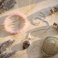 Thread of Companionship Aligned Pairing | Friendship Jewelry Set featuring a pink Manganese Calcite bracelet and Chiastolite pendant on a silver chain. Ideal for emotional support and friendship bonding.