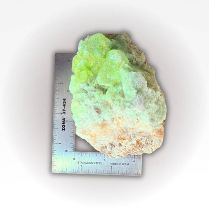 Green fluorite quartz specimen from Wise Mine shown with ruler for scale. 403g rare mineral with vibrant color and collectible quality.