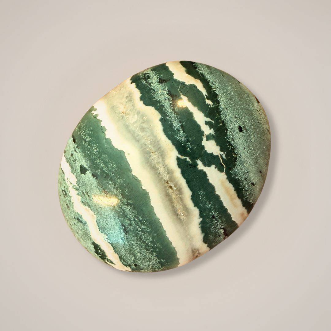 Green Zebra Jasper polished palm stone with green and cream stripes