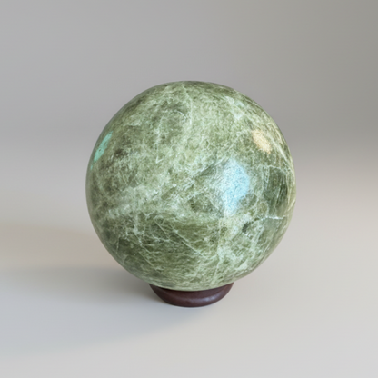 Green Infinite Stone Sphere - Heart Chakra Aid made from Serpentine & Chrysotile, ideal for energy work and chakra balancing in crystal collections.