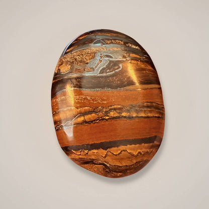 Close up of Tiger Iron Palm Stone — Medium 