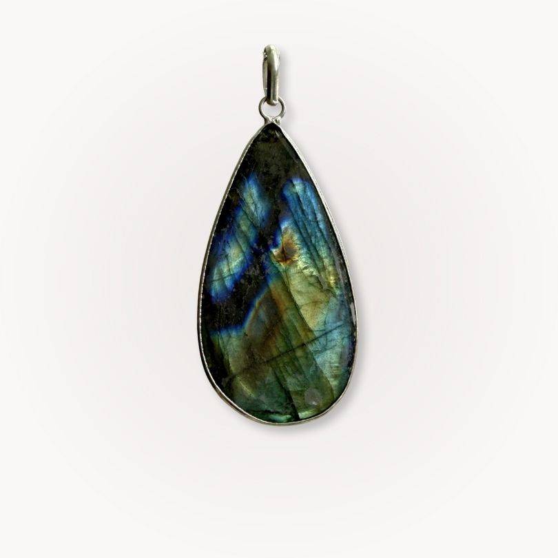 Close-up back view of a Labradorite Statement Pendant featuring polished teardrop gemstone with vibrant blue flash for intuition and inner vision.