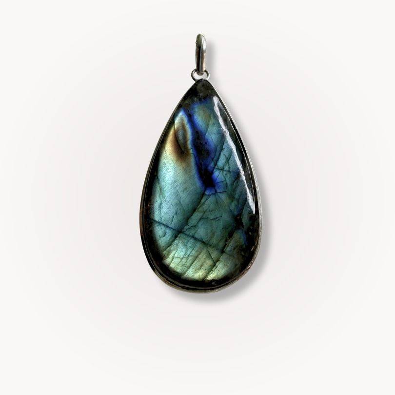 Polished Labradorite Statement Pendant with deep blue and green tones, ideal for enhancing intuition and personal growth.