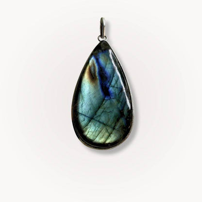 Polished Labradorite Statement Pendant with deep blue and green tones, ideal for enhancing intuition and personal growth.