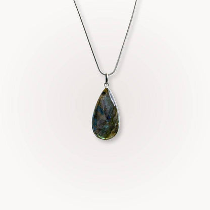 Labradorite Statement Pendant with blue flash on silver chain, designed for intuition and protection in jewelry collections.