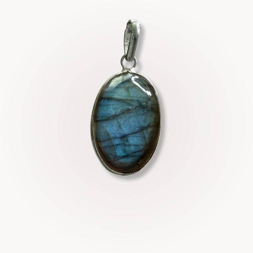 Close-up of Labradorite Classic Pendant featuring a polished oval gemstone in silver setting, ideal for clarity and energy alignment.