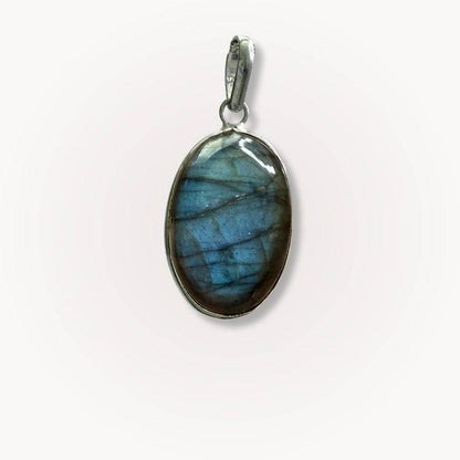 Close-up of Labradorite Classic Pendant featuring a polished oval gemstone in silver setting, ideal for clarity and energy alignment.
