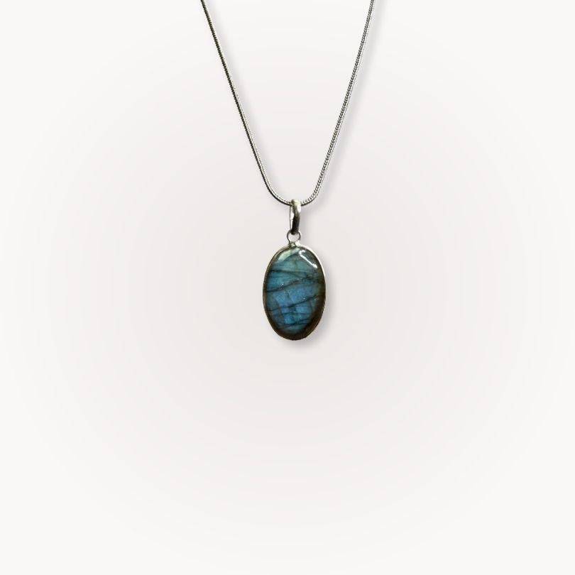Labradorite Classic Pendant with oval gemstone on silver chain, offering intuition, protection, and clarity for daily spiritual wear.