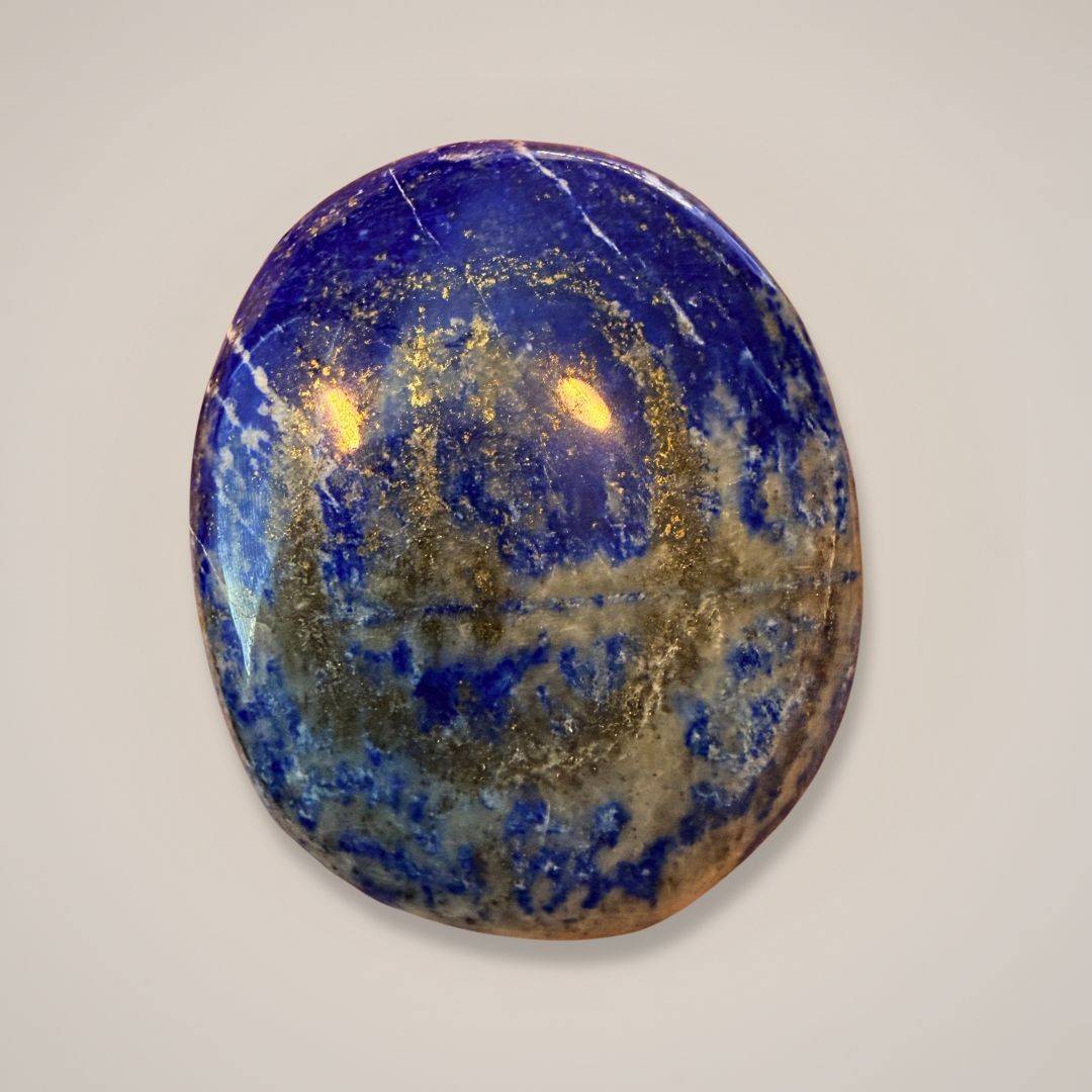 Lapis Lazuli gemstone with deep blue color and gold flecks