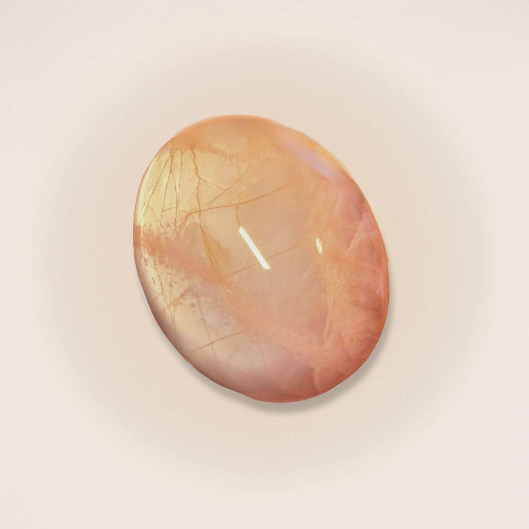 Polished Peach Moonstone Palm Stone Medium with soft peach hues and natural veining, ideal for healing and meditation rituals.