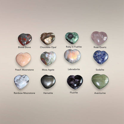 Assortment of polished Madagascar heart stones arranged in a grid to show the current intuitively chosen selection.