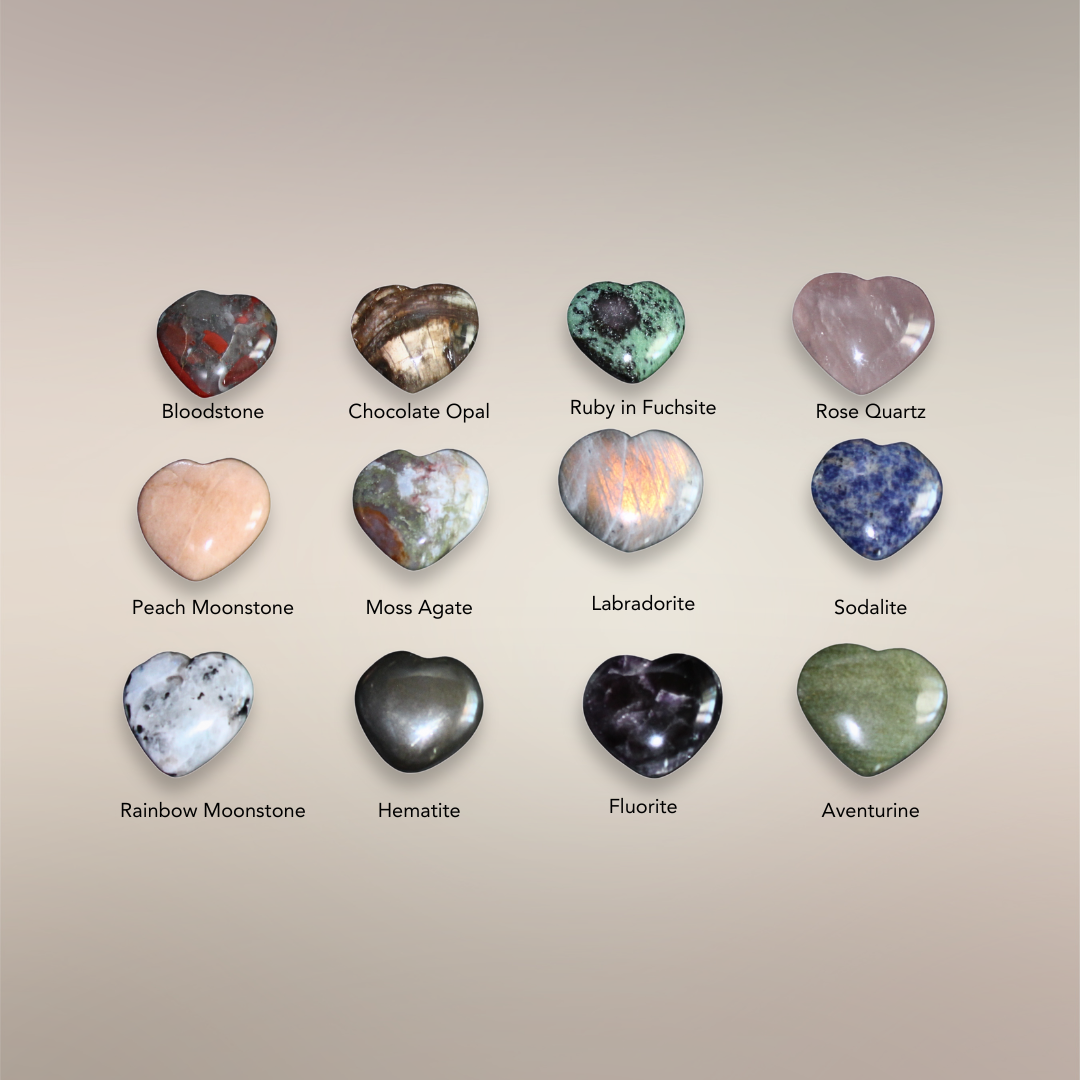 Assortment of polished Madagascar heart stones arranged in a grid to show the current intuitively chosen selection.
