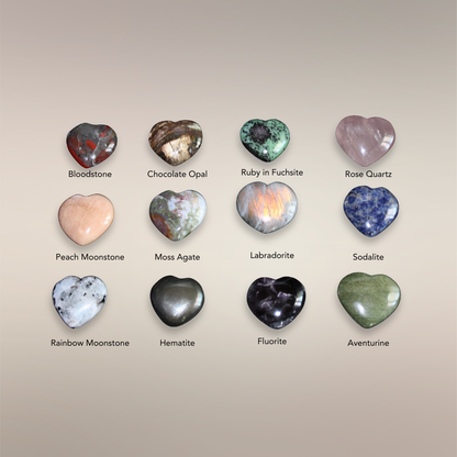 Assortment of polished Madagascar heart stones arranged in a grid to show the current intuitively chosen selection.