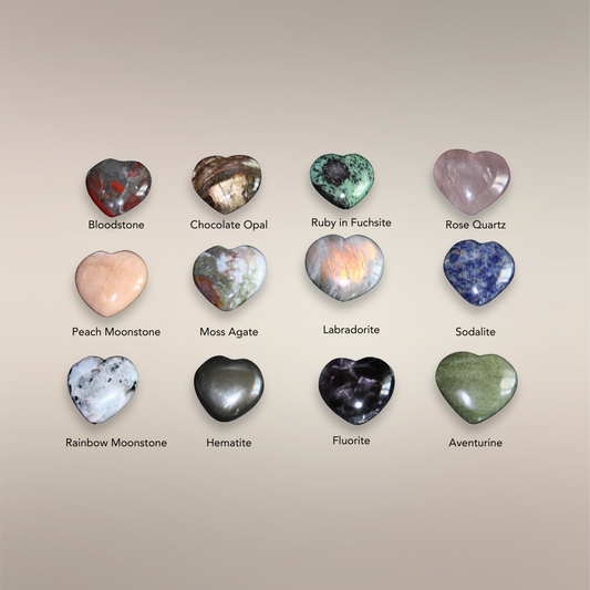 Assortment of polished Madagascar heart stones arranged in a grid to show the current intuitively chosen selection.